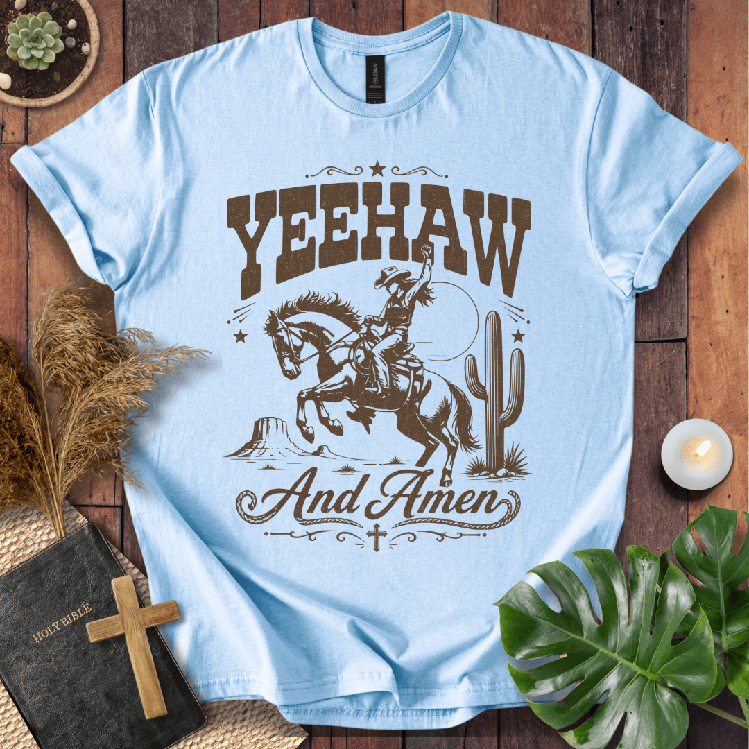 Yeehaw and Amen Christian t shirt for women featuring a vintage brown graphic of a cowgirl riding a bucking horse.