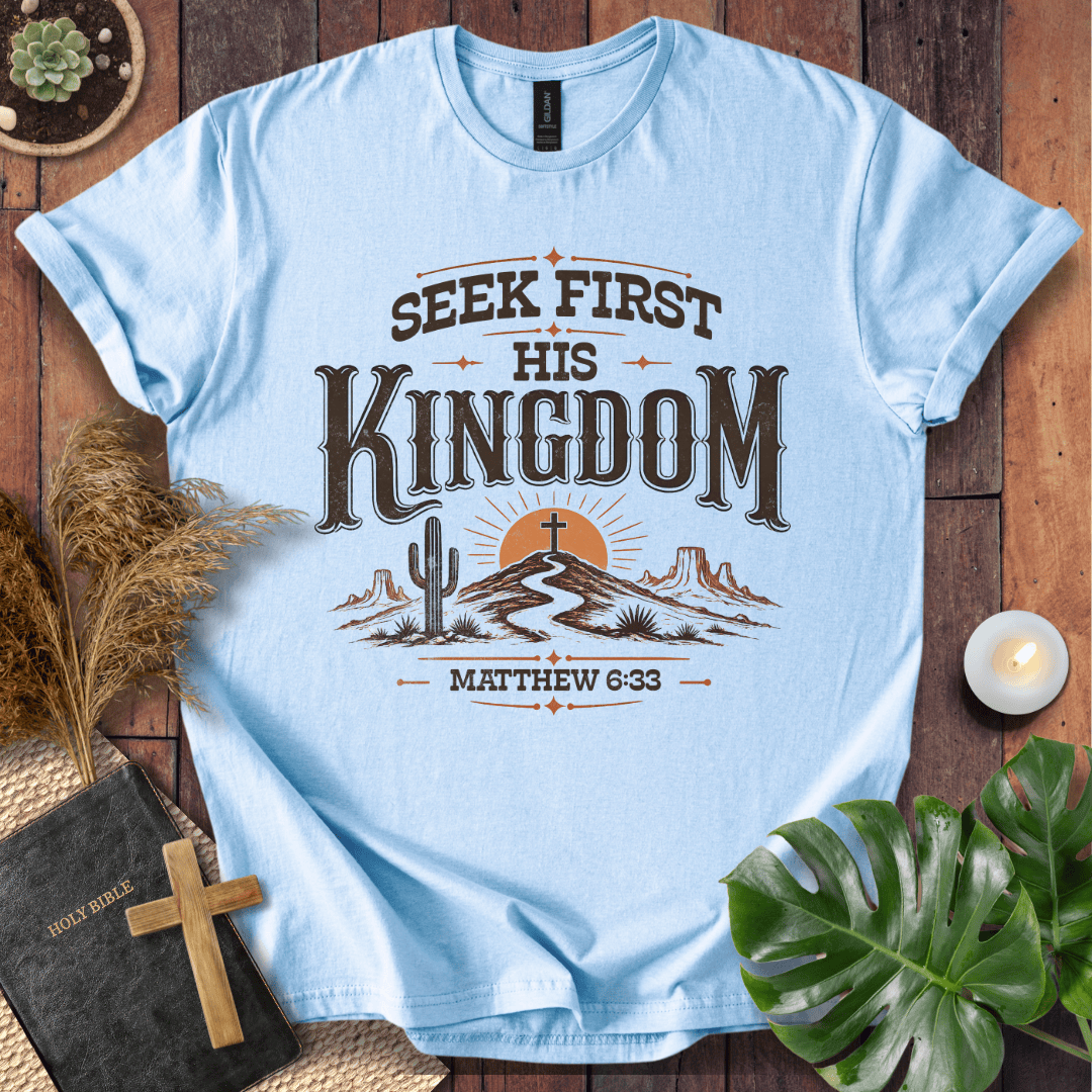 Seek First His Kingdom Matthew 6:33 t shirt with desert cactus and cross design on a rustic wood background.