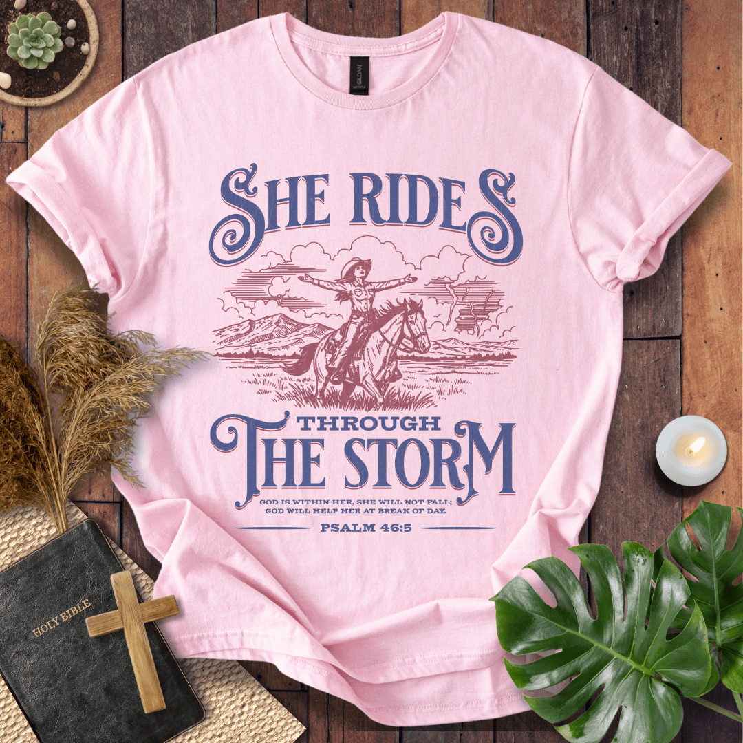 Cowgirl Christian shirt – She Rides Through the Storm tee by Rooted Threads