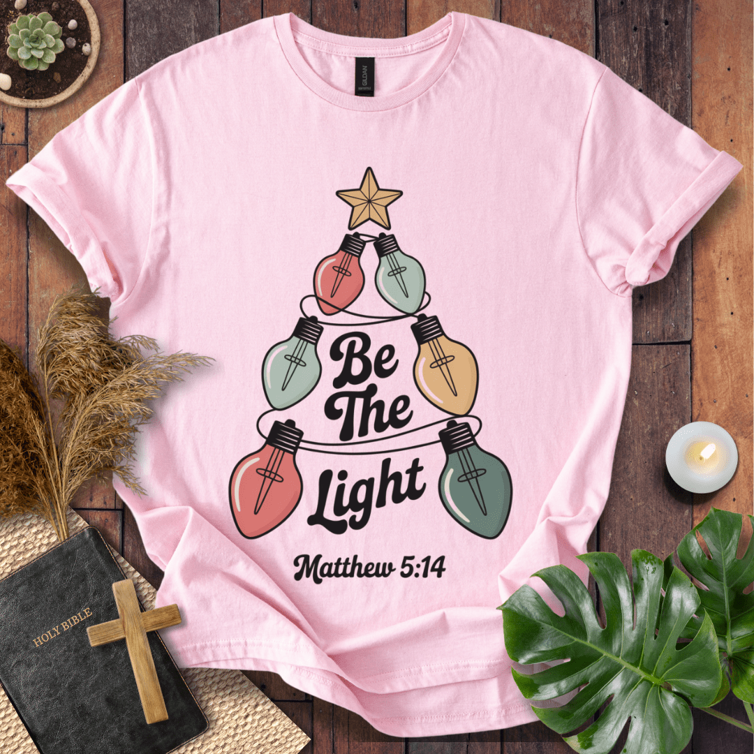 Faith Christmas shirt encouraging believers to shine their light – religious holiday tee
