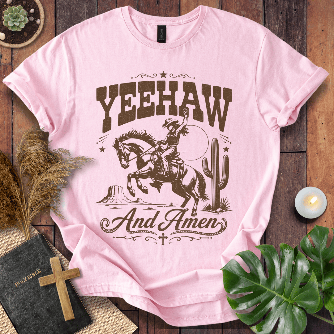 Yeehaw and Amen Christian t shirt for women featuring a vintage brown graphic of a cowgirl riding a bucking horse.