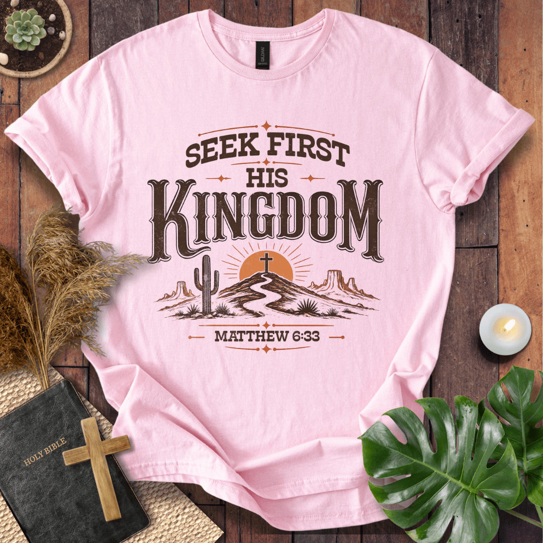 Seek First His Kingdom Matthew 6:33 t shirt with desert cactus and cross design on a rustic wood background.