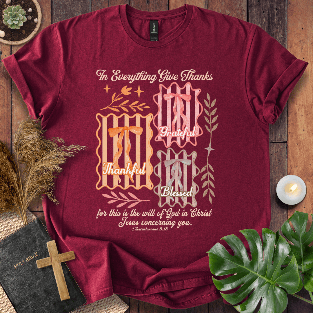 Christian t-shirt with "In Everything Give Thanks" 1 Thessalonians 5:18 verse, pink bows, and botanical vintage graphics.