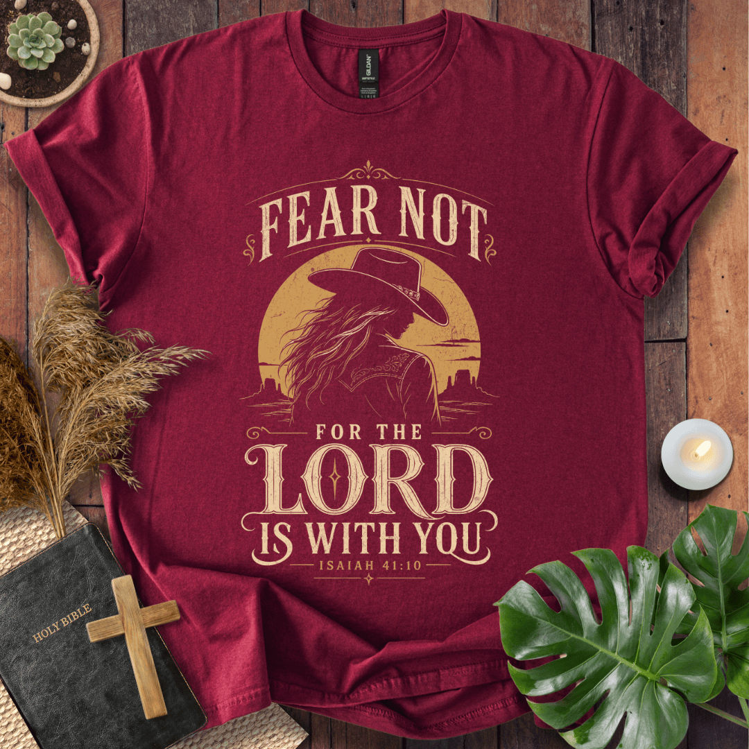 Christian t-shirt with a cowgirl silhouette, desert sunset, and Isaiah 41:10 Bible verse scripture.