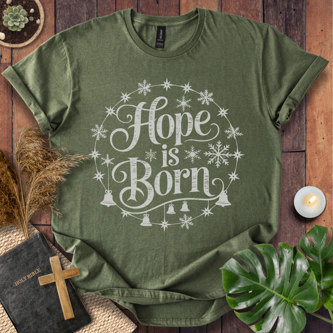 Hope Is Born Christian Christmas t-shirt with festive snowflake design