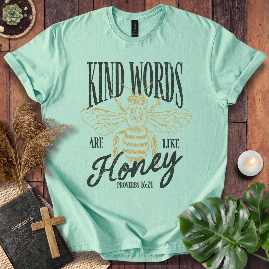 Proverbs 16:24 "Kind Words Are Like Honey" t-shirt featuring a vintage gold honeybee graphic and rustic text.