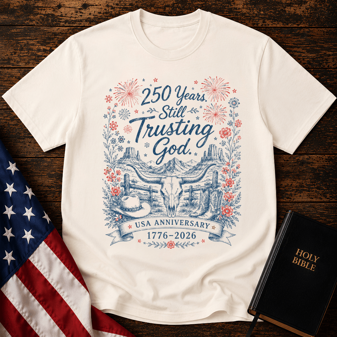 patriotic western graphic tee featuring a longhorn skull, cowboy boots, fireworks, and 1776-2026 text.