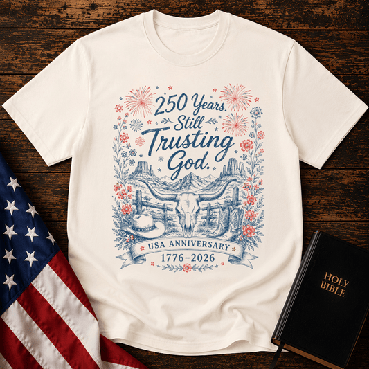 patriotic western graphic tee featuring a longhorn skull, cowboy boots, fireworks, and 1776-2026 text.