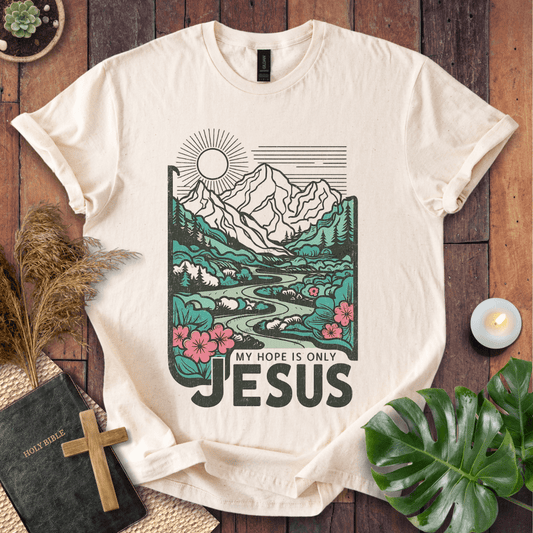 My Hope Is Only Jesus Christian t-shirt in white—mountain and river graphic with florals.