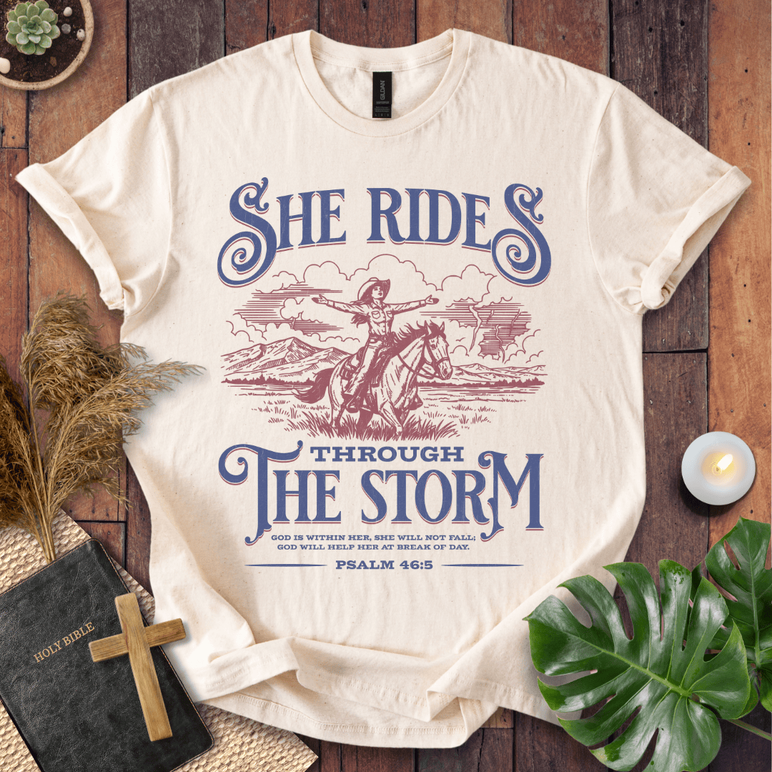 Cowgirl Christian shirt – She Rides Through the Storm tee by Rooted Threads