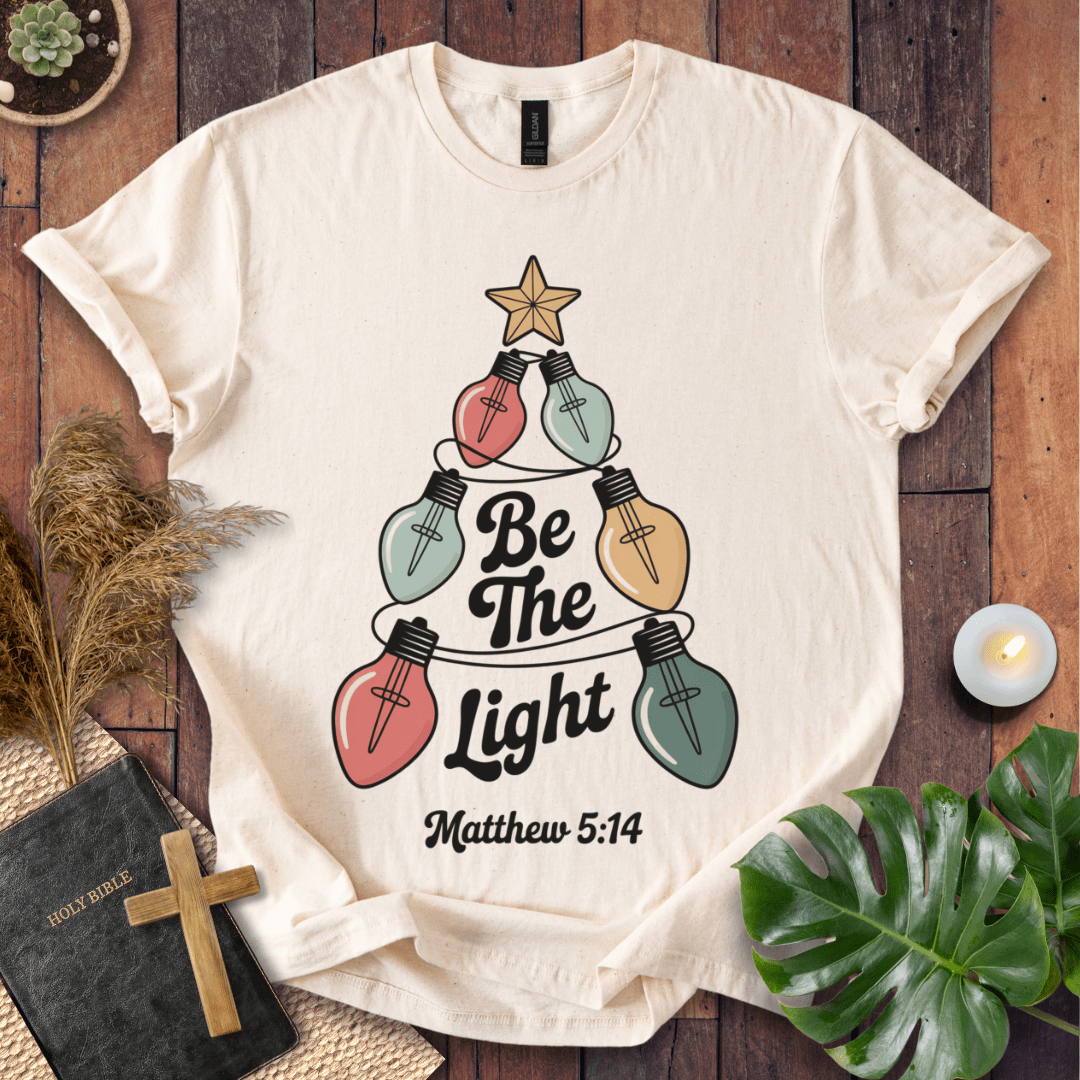 Faith Christmas shirt encouraging believers to shine their light – religious holiday tee