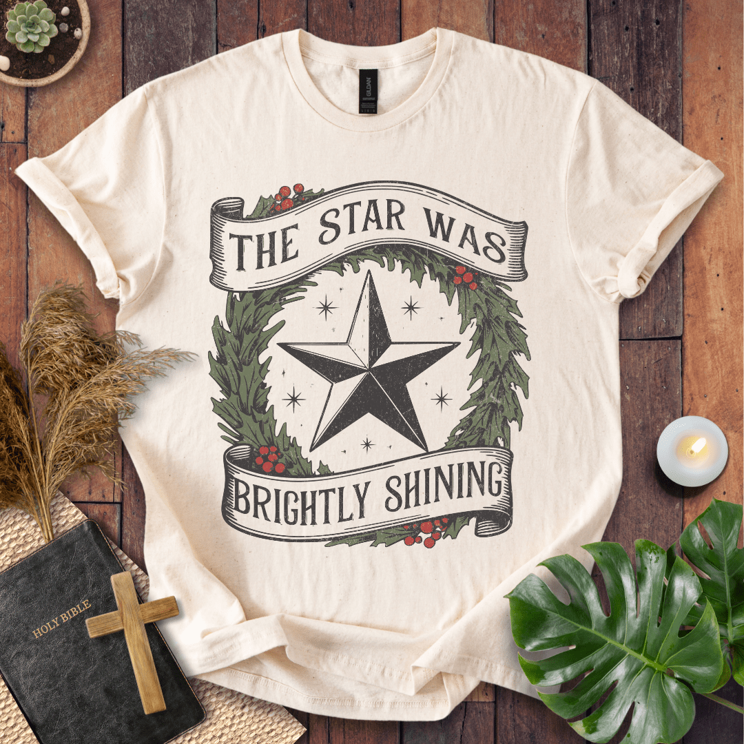 The Star Was Brightly Shining Christian Christmas t-shirt with wreath and star design