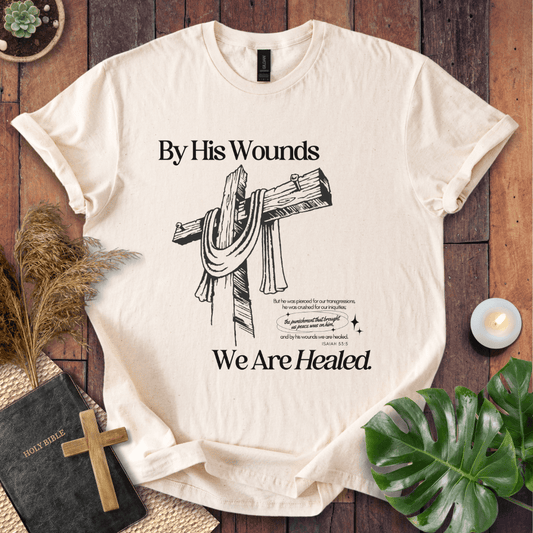 Easter Christian t-shirt featuring a rustic wooden cross with Isaiah 53:5 text, "By His Wounds We Are Healed.