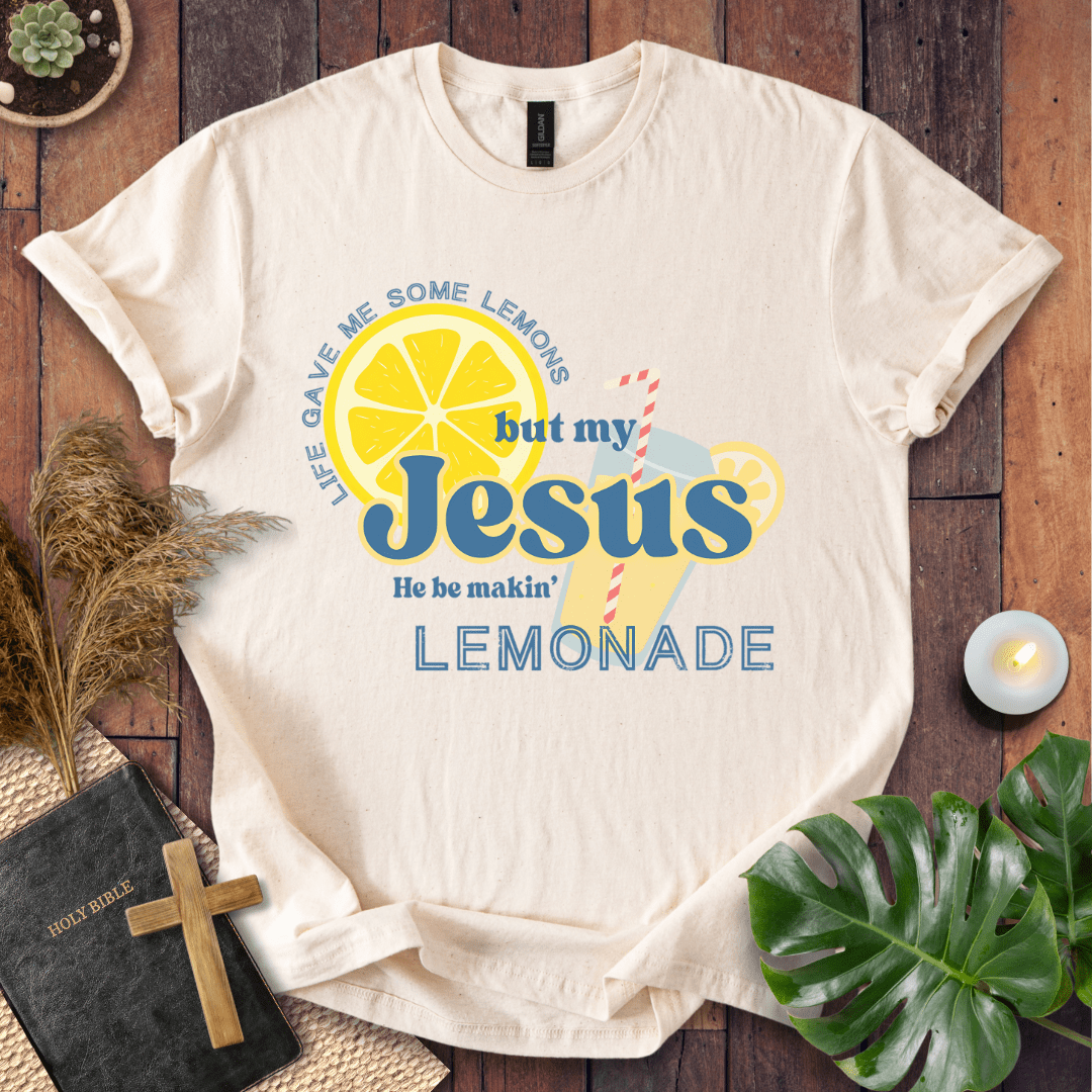 “Life gave me lemons but my Jesus makes lemonade” Christian t-shirt with bold lemon and straw graphic; playful faith tee.