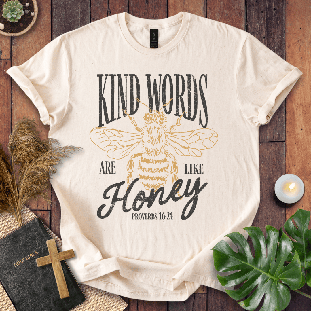 Proverbs 16:24 "Kind Words Are Like Honey" t-shirt featuring a vintage gold honeybee graphic and rustic text.