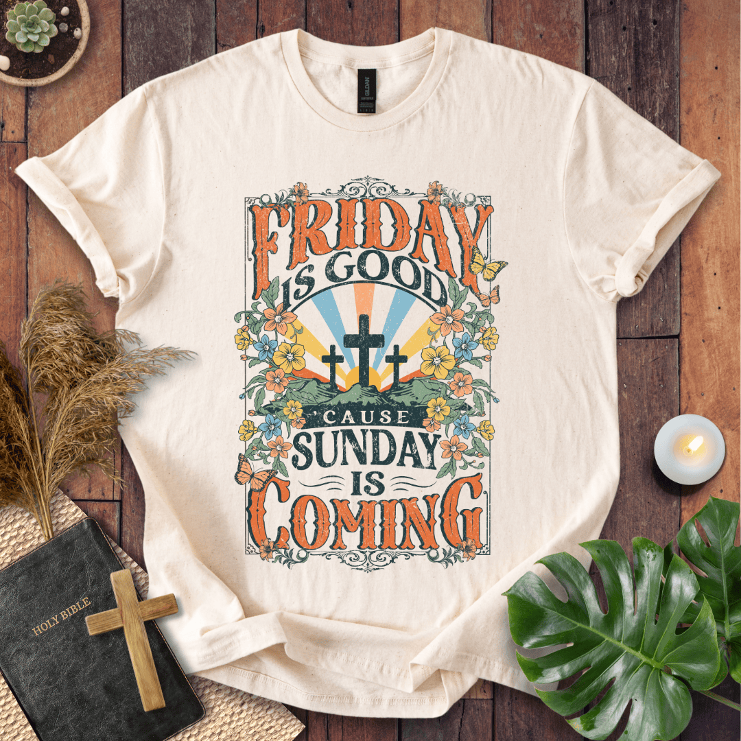 Christian Easter t-shirt featuring "Friday is Good Cause Sunday is Coming" vintage design with three crosses and wildflowers.