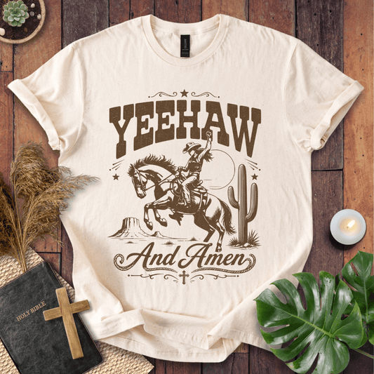 Yeehaw and Amen Christian t shirt for women featuring a vintage brown graphic of a cowgirl riding a bucking horse.