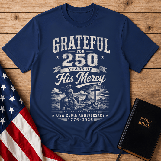 Christian t shirts featuring a cowboy on a horse looking at a cross for the USA 250th anniversary.