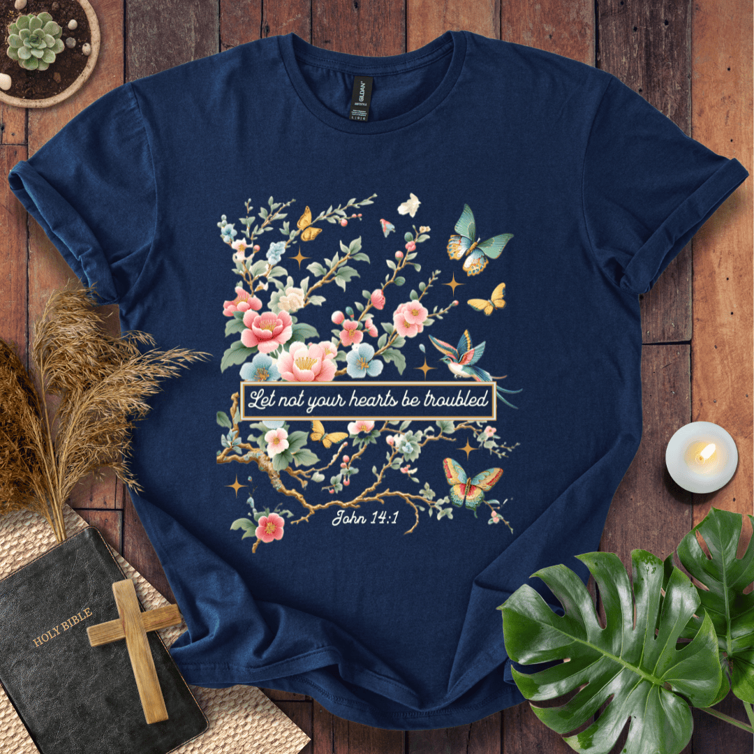 Christian t shirt for women featuring John 14:1 with pink flowers, butterflies, and a hummingbird in a botanical style.
