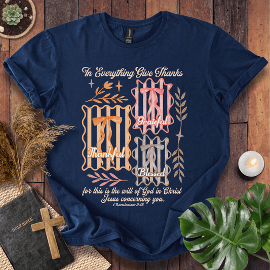 Christian t-shirt with "In Everything Give Thanks" 1 Thessalonians 5:18 verse, pink bows, and botanical vintage graphics.