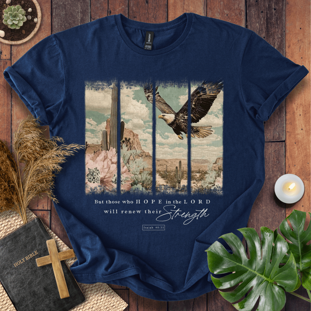 Isaiah 40:31 Christian t-shirt in forest green—flying eagle over desert cactus panels; renew their strength.