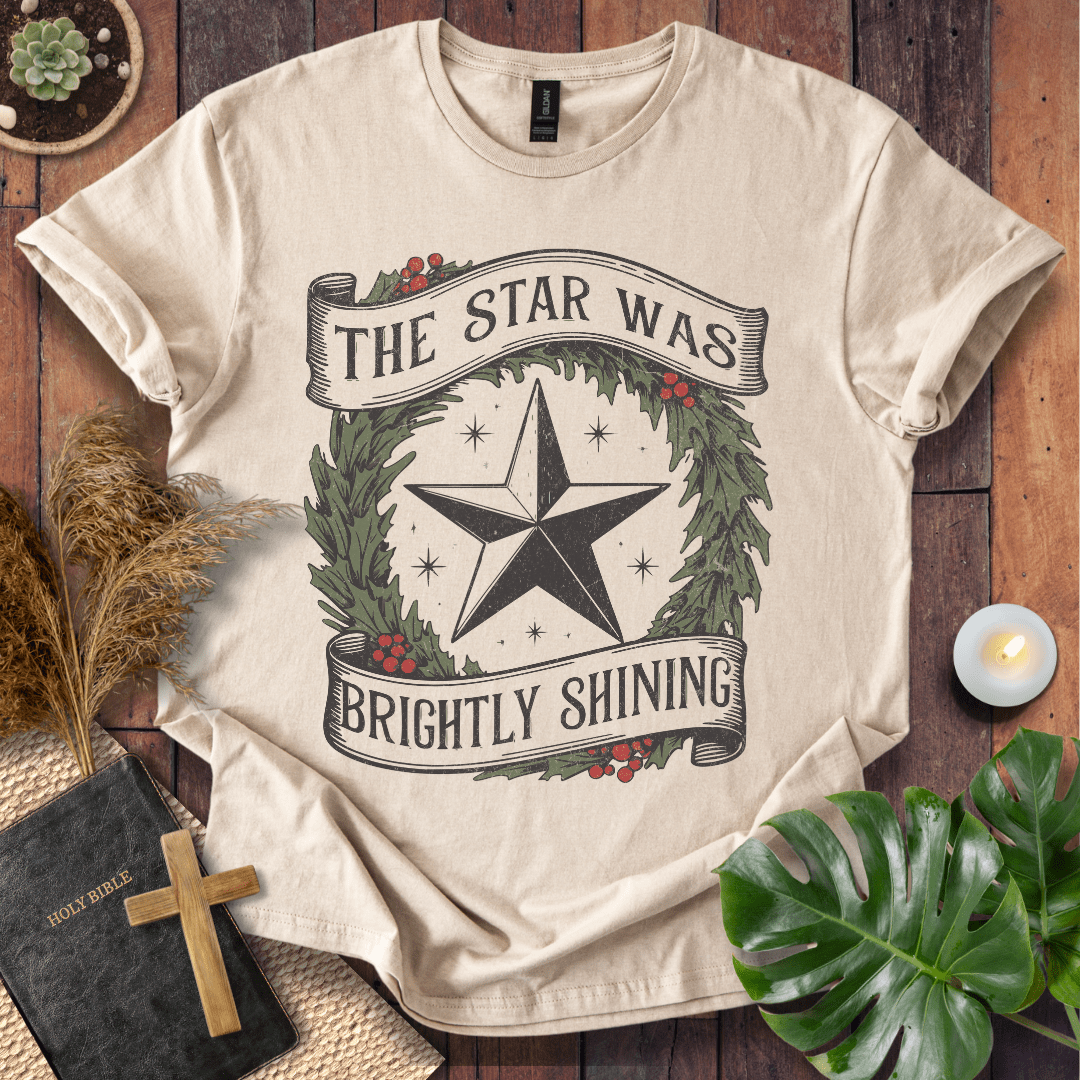 The Star Was Brightly Shining Christian Christmas t-shirt with wreath and star design