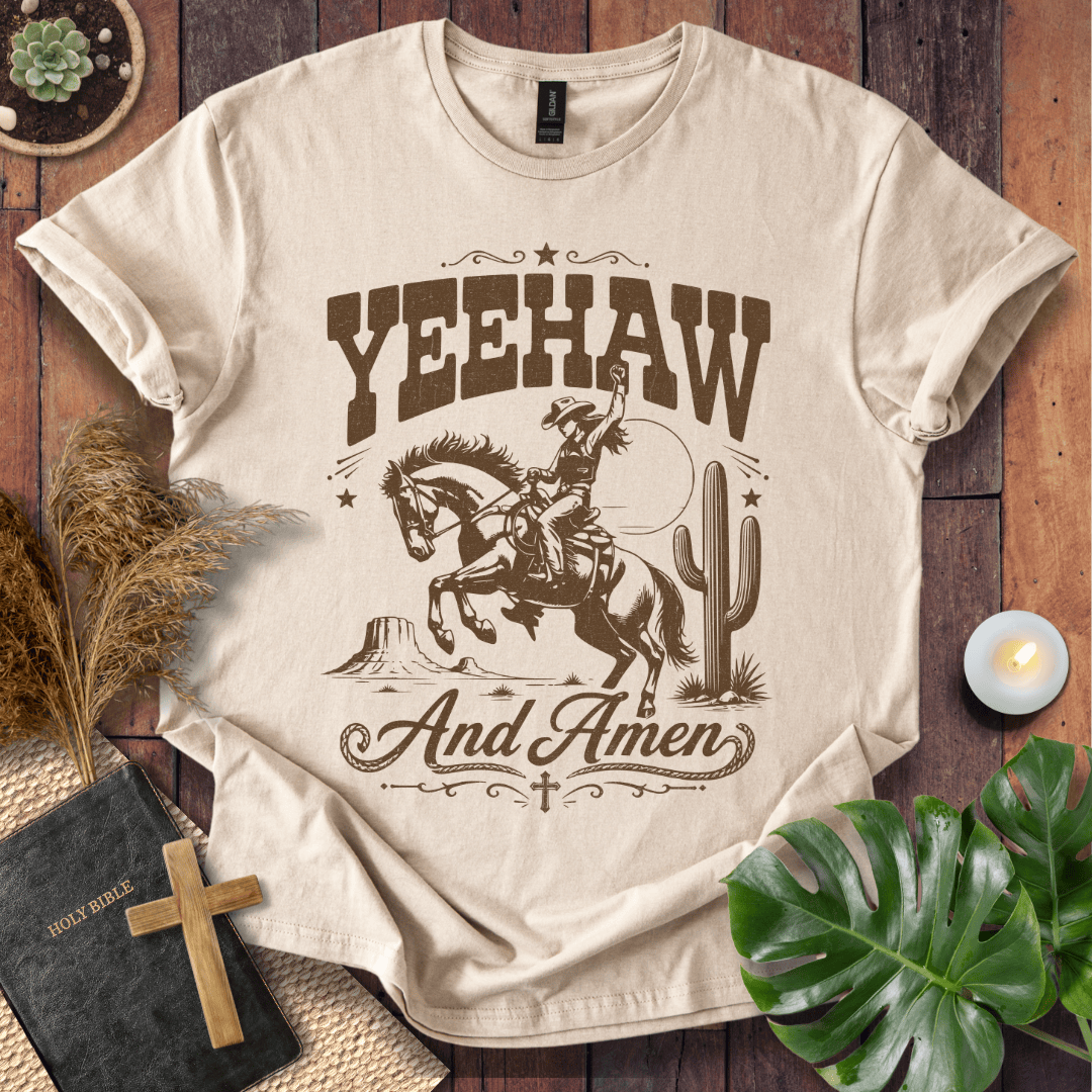 Yeehaw and Amen Christian t shirt for women featuring a vintage brown graphic of a cowgirl riding a bucking horse.