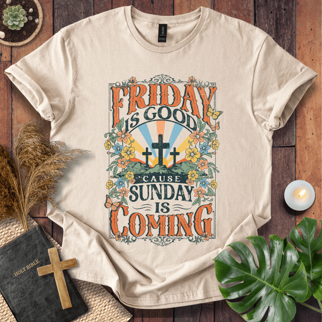 Christian Easter t-shirt featuring "Friday is Good Cause Sunday is Coming" vintage design with three crosses and wildflowers.