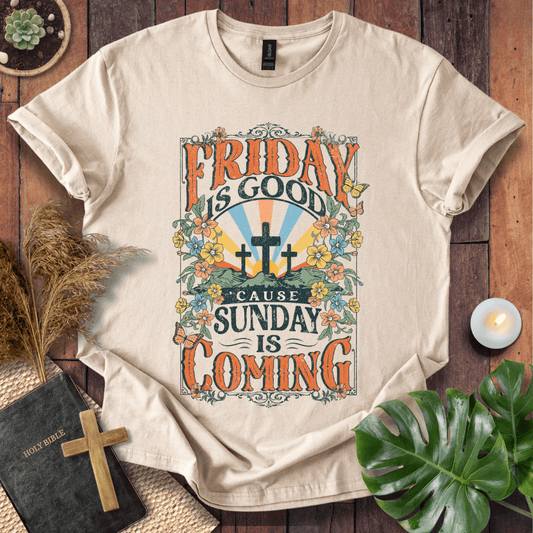 Christian Easter t-shirt featuring "Friday is Good Cause Sunday is Coming" vintage design with three crosses and wildflowers.