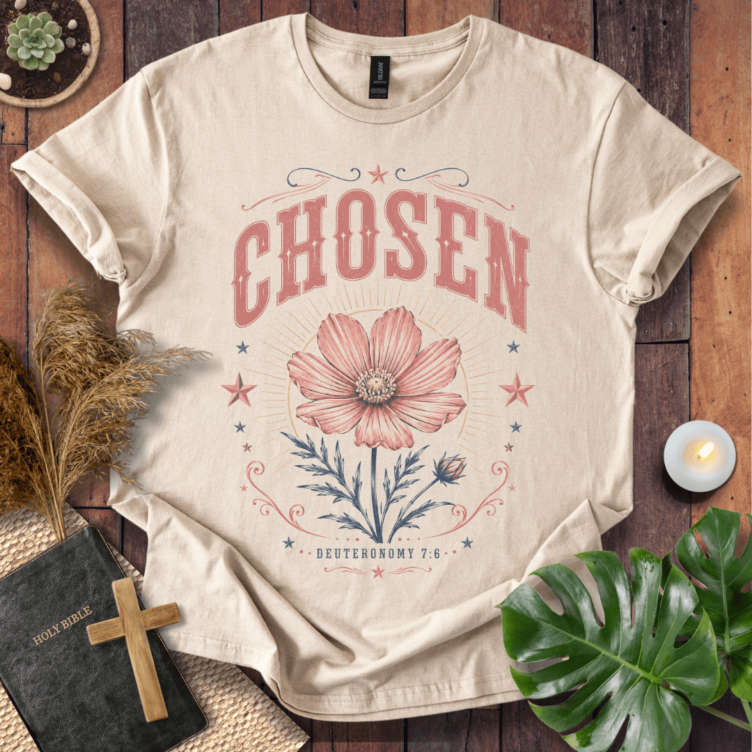 a sand-colored Christian t shirt for women featuring a vintage wildflower design and Deuteronomy 7:6.