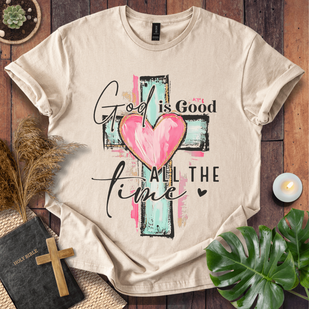 God is Good All the Time Christian t-shirt—brushstroke cross with heart and hand-lettered script.