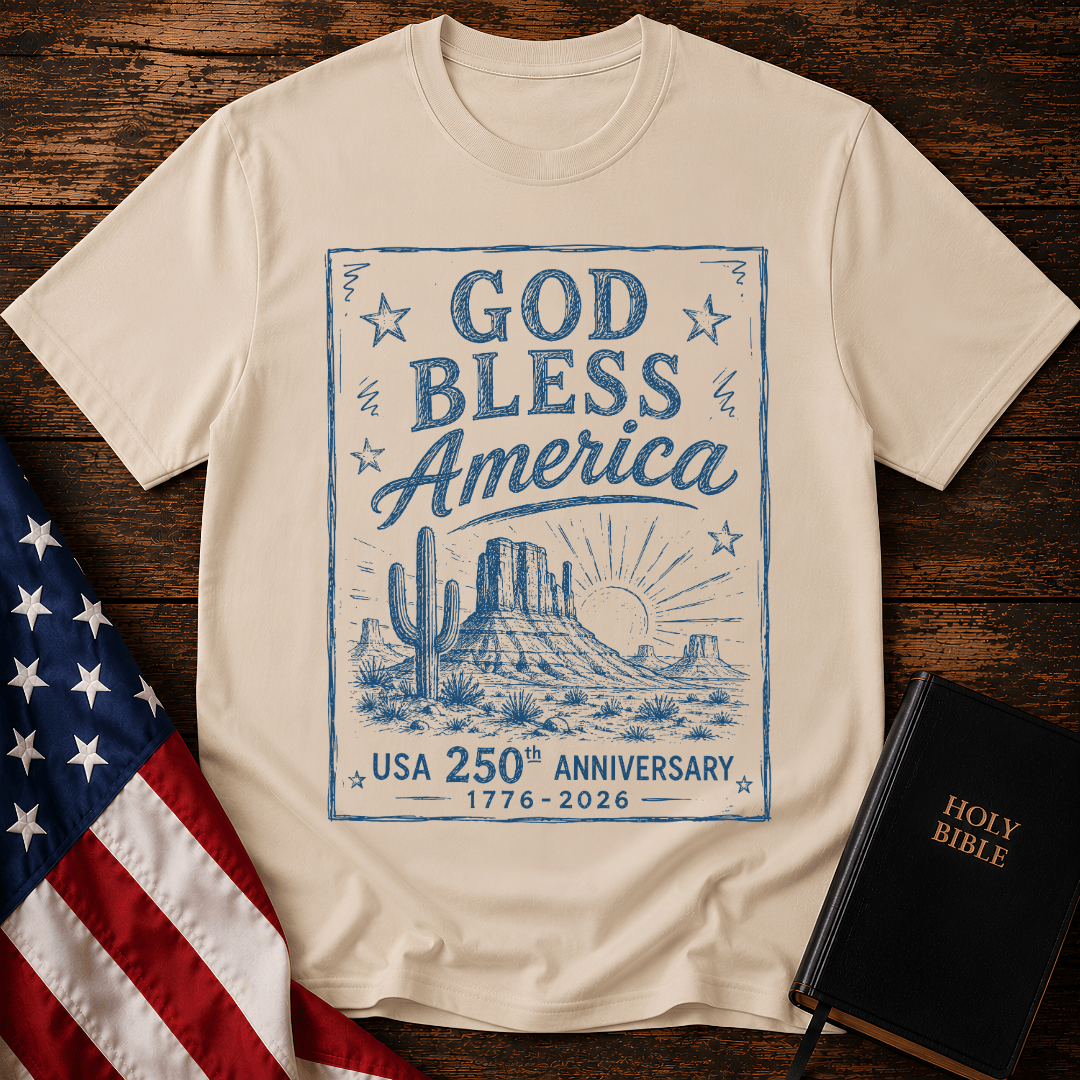 graphic tee reading God Bless America USA 250th Anniversary 1776-2026 with a western desert sketch design.