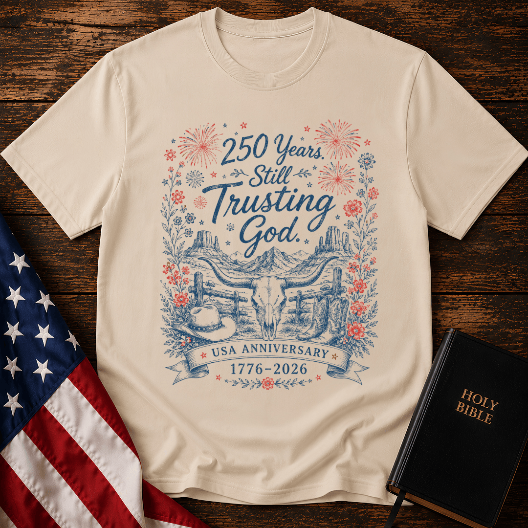 patriotic western graphic tee featuring a longhorn skull, cowboy boots, fireworks, and 1776-2026 text.