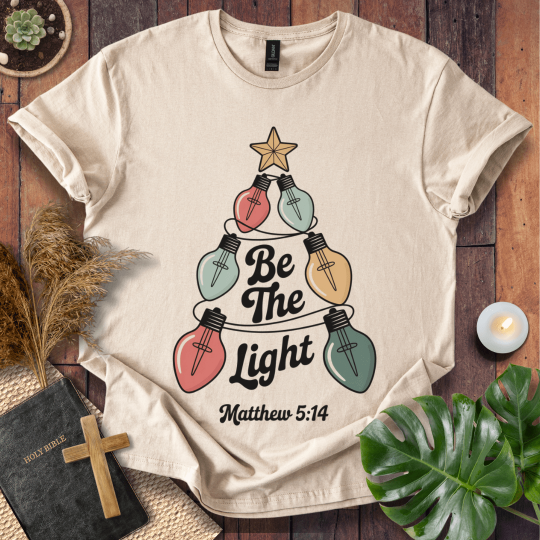 Faith Christmas shirt encouraging believers to shine their light – religious holiday tee
