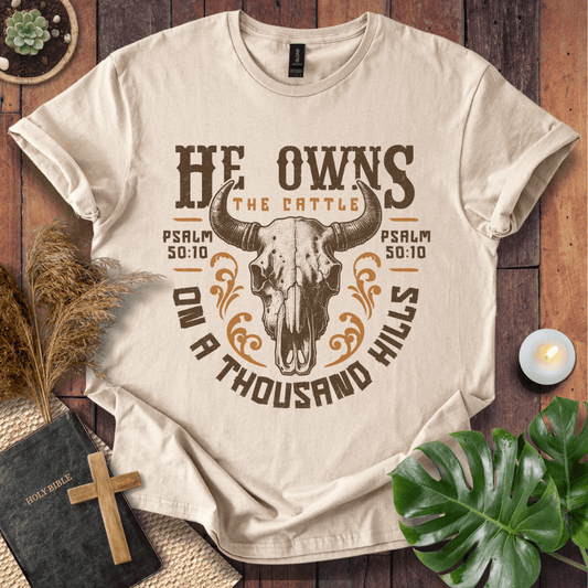 Christian t shirt for women featuring a longhorn skull and Psalm 50:10 He owns the cattle on a thousand hills.