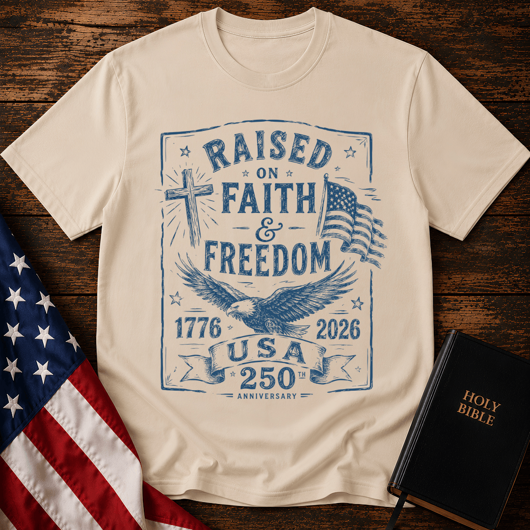 Patriotic Christian t shirts for women with a blue sketch of a cross, eagle, American flag, and 1776-2026.