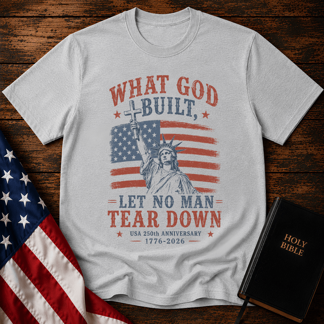 Patriotic Christian t shirt featuring the Statue of Liberty holding a cross over an American flag for the USA 250th anniversary.