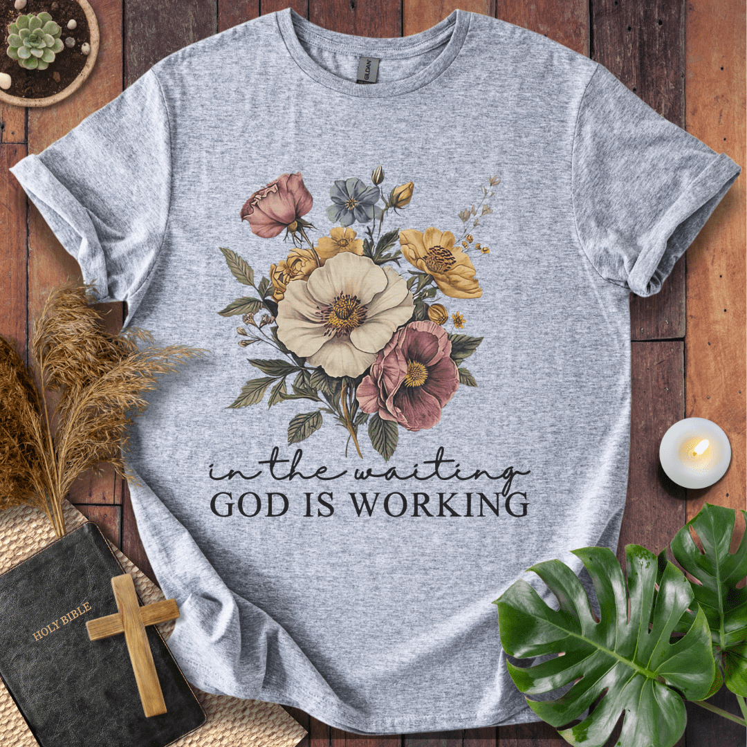 “In the Waiting God Is Working” Christian t-shirt with vintage floral bouquet and script; modern faith tee.