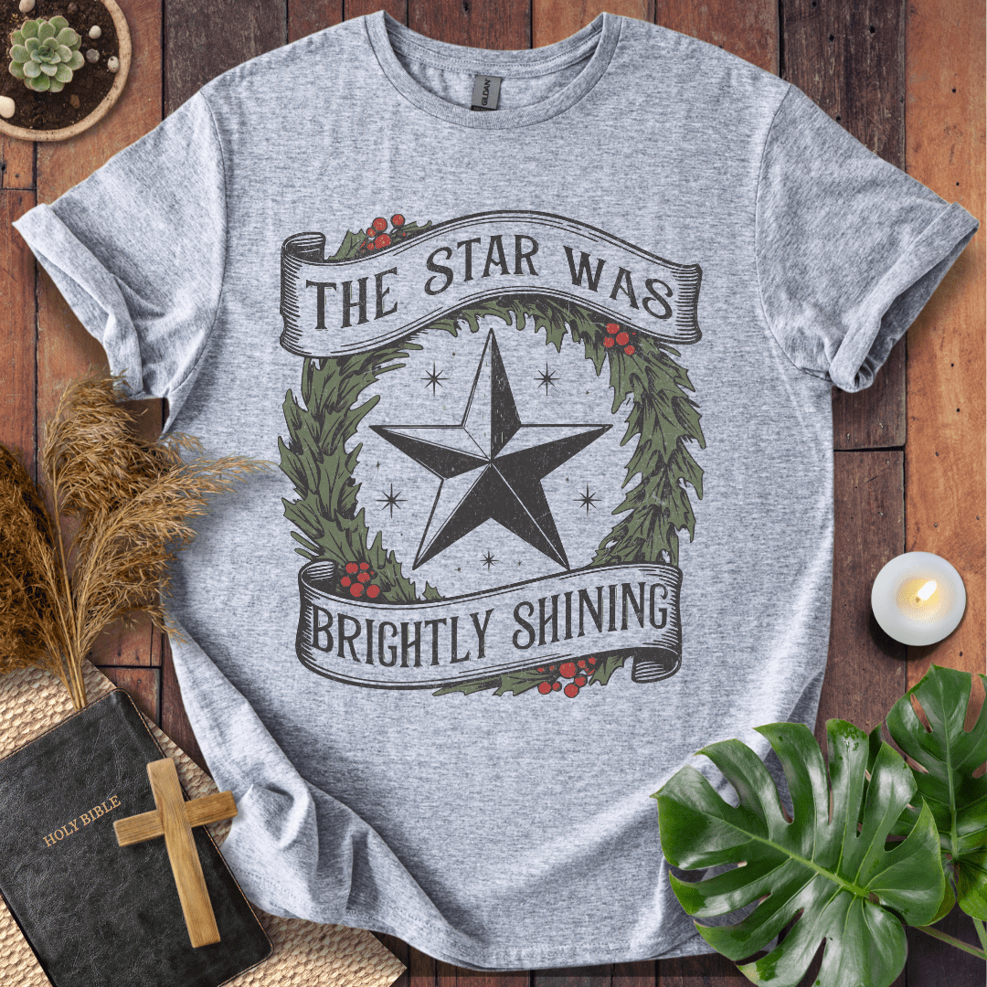 The Star Was Brightly Shining Christian Christmas t-shirt with wreath and star design