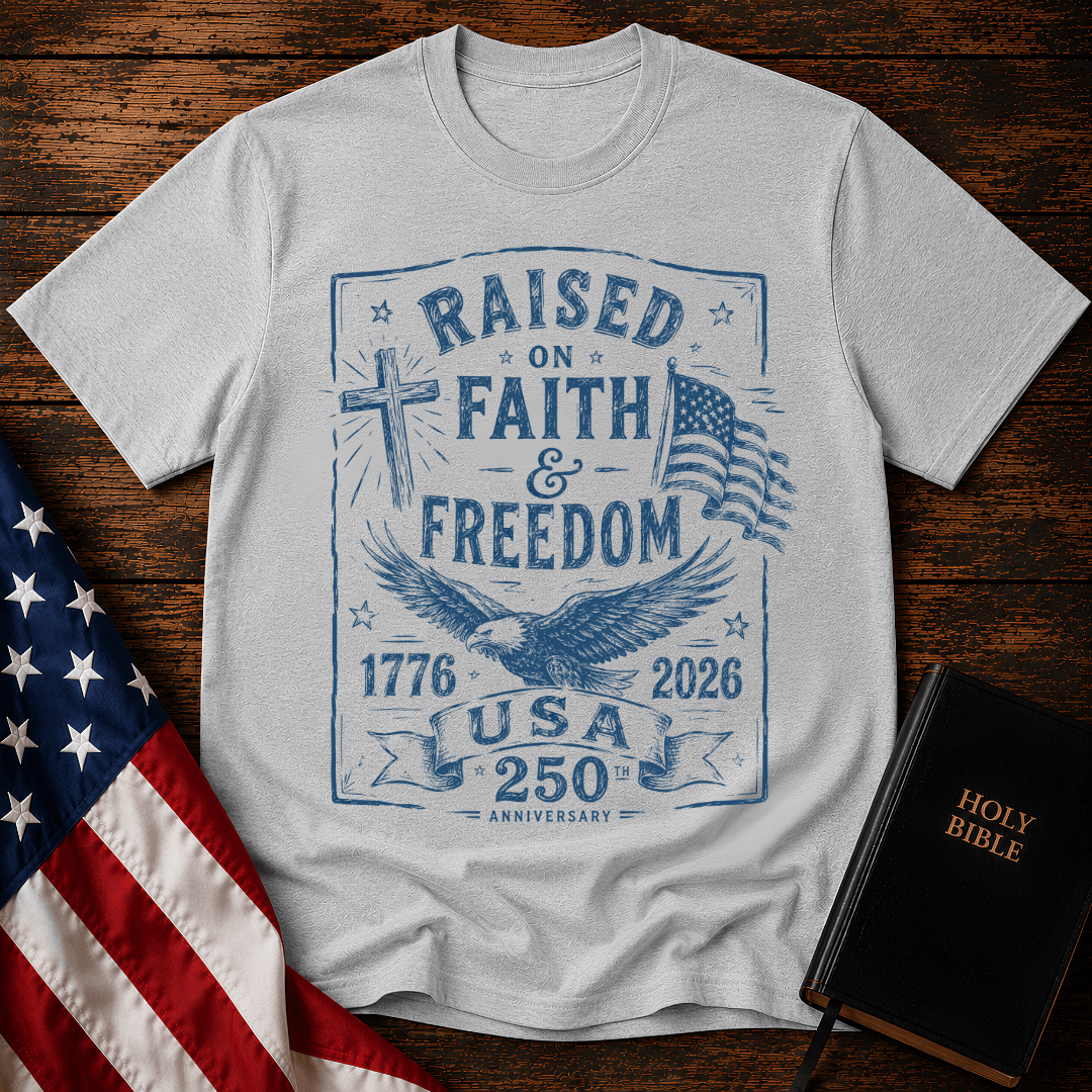 Patriotic Christian t shirts for women with a blue sketch of a cross, eagle, American flag, and 1776-2026.