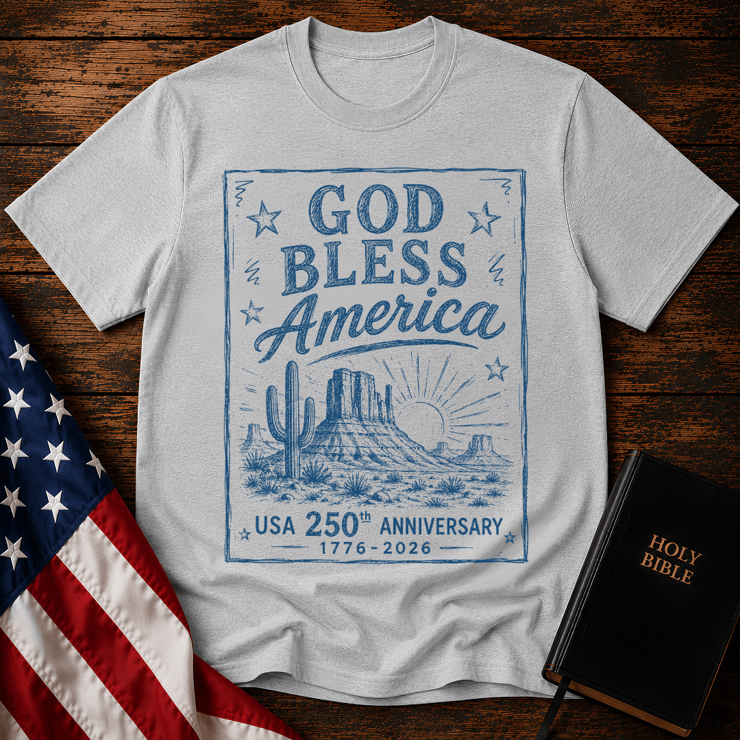 graphic tee reading God Bless America USA 250th Anniversary 1776-2026 with a western desert sketch design.