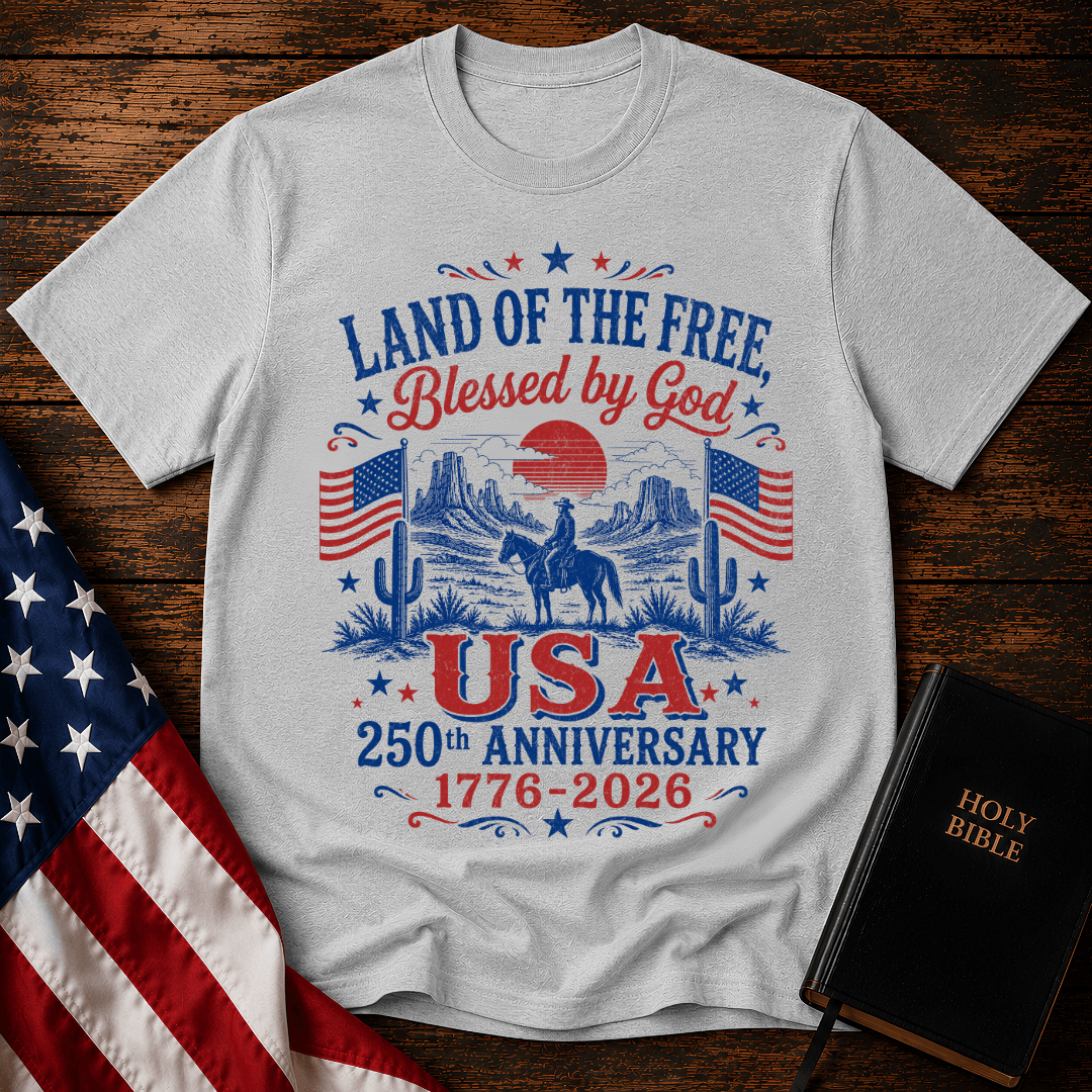 Vintage USA 250th anniversary Christian t shirt featuring a cowboy on a horse in a desert landscape with American flags.
