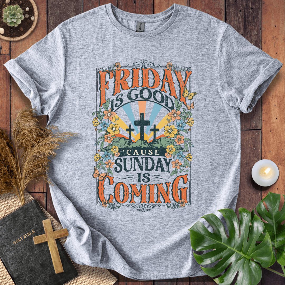 Christian Easter t-shirt featuring "Friday is Good Cause Sunday is Coming" vintage design with three crosses and wildflowers.