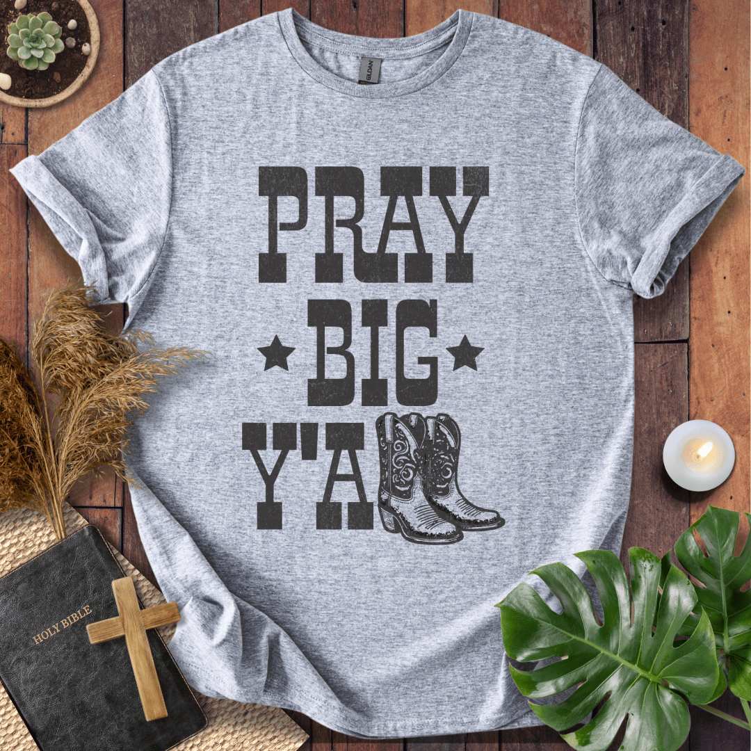 A women's Christian tee shirts featuring boots and "Pray Big Y'all," perfect for bible quote shirts fans.