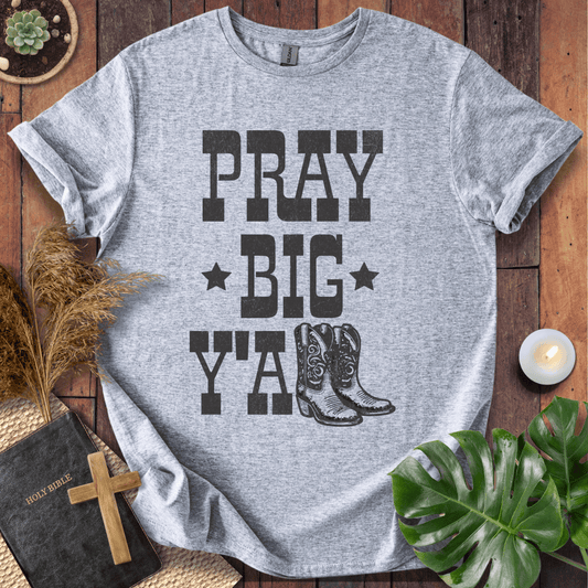 A women's Christian tee shirts featuring boots and "Pray Big Y'all," perfect for bible quote shirts fans.