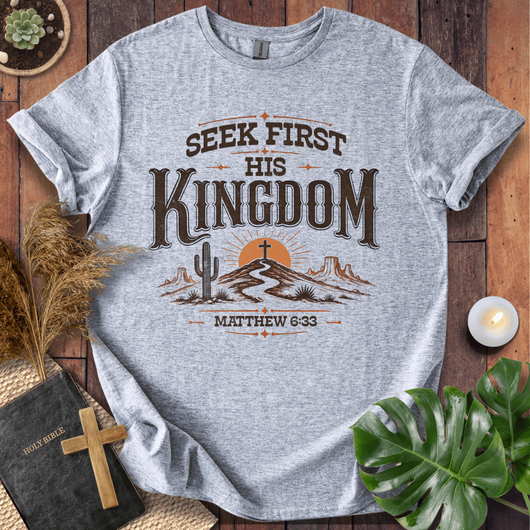 Seek First His Kingdom Matthew 6:33 t shirt with desert cactus and cross design on a rustic wood background.