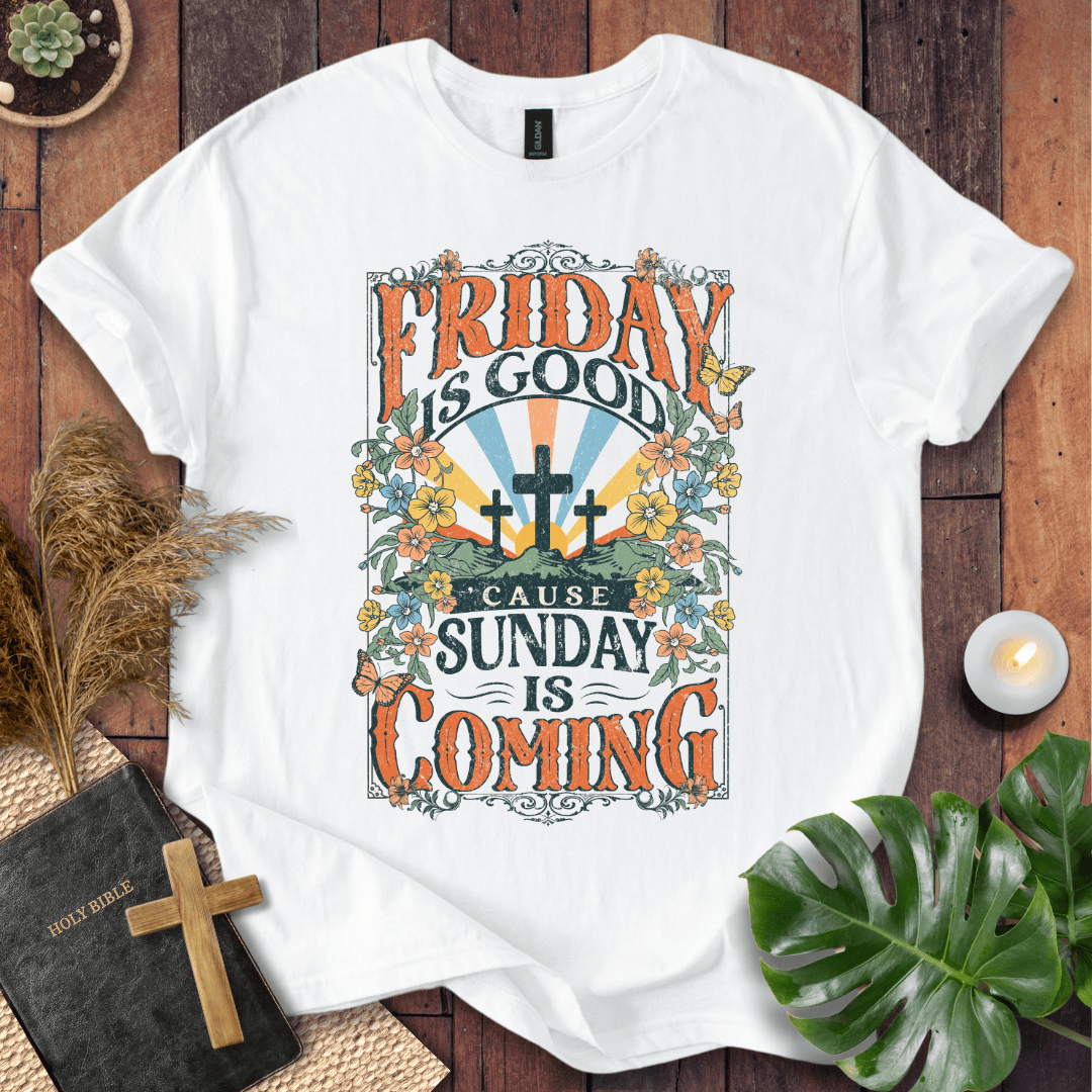 Christian Easter t-shirt featuring "Friday is Good Cause Sunday is Coming" vintage design with three crosses and wildflowers.