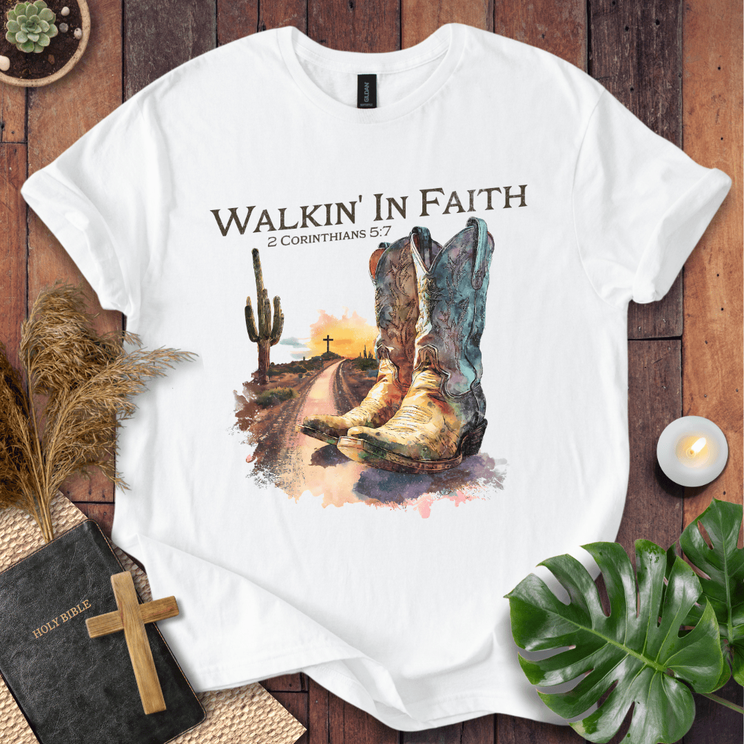Christian t shirt with watercolor cowboy boots, a desert path, saguaro cactus, and 2 Corinthians 5:7 scripture.