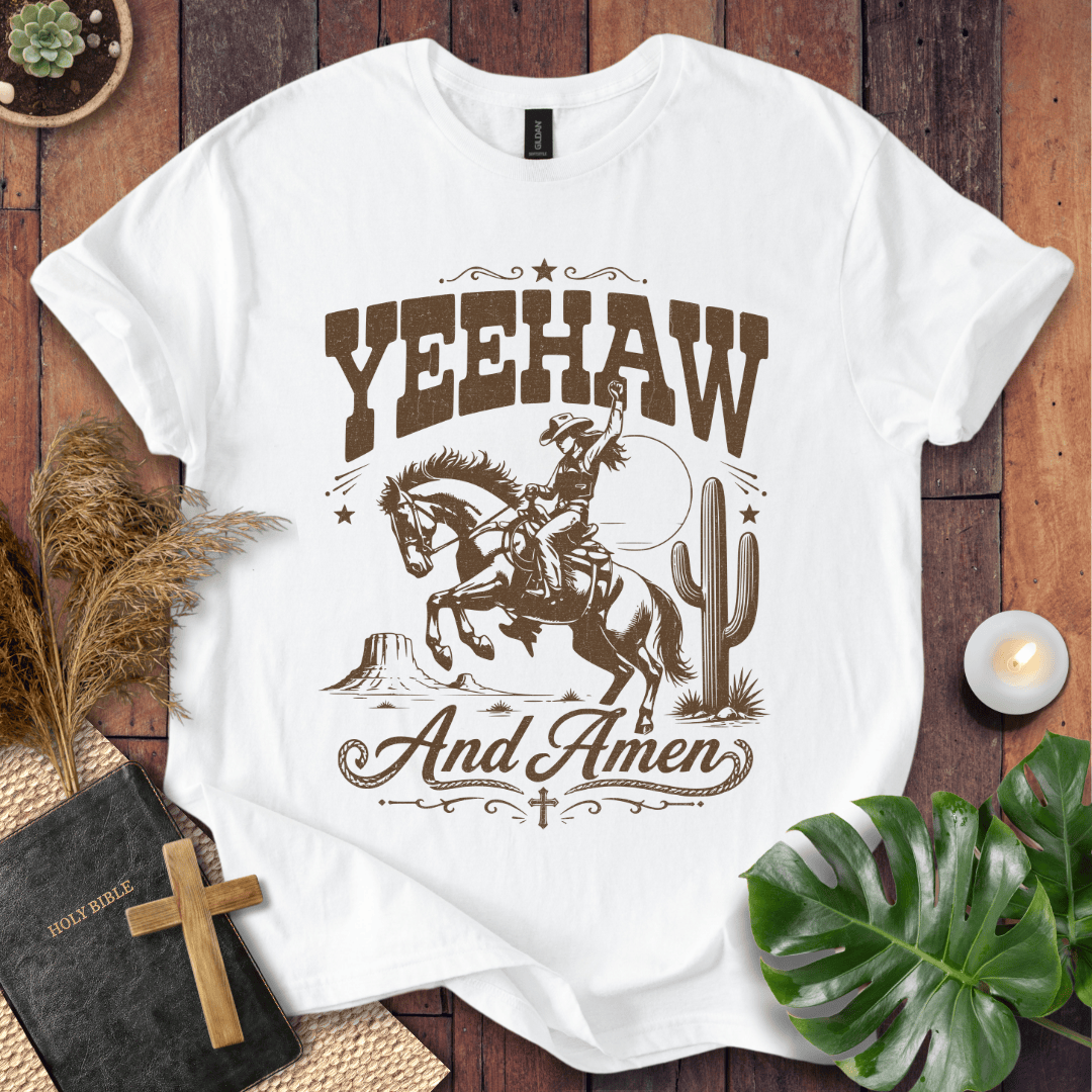Yeehaw and Amen Christian t shirt for women featuring a vintage brown graphic of a cowgirl riding a bucking horse.
