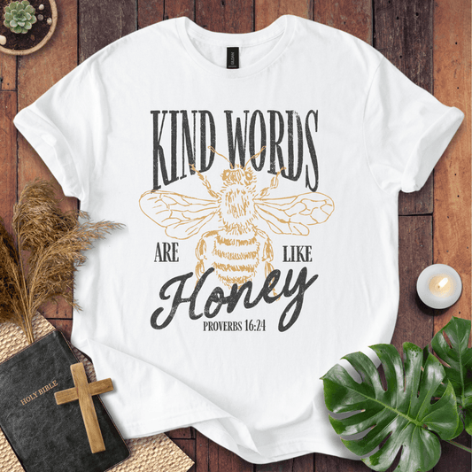 Proverbs 16:24 "Kind Words Are Like Honey" t-shirt featuring a vintage gold honeybee graphic and rustic text.